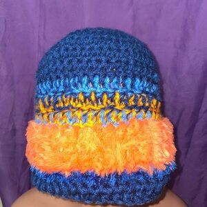 Handmade blue and orange crochet hat with fur